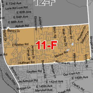 City map fragment highlighting district 11-F in orange, with surrounding streets labeled.