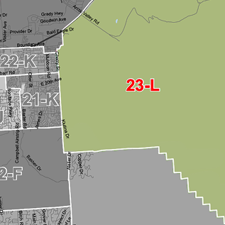 Map showing a large green parcel labeled 23-L adjacent to gray residential blocks 21-K and 22-K on the west side.