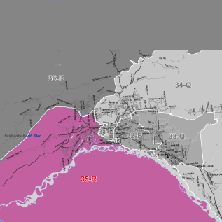 Map of a coastal region with a large purple area labeled 35-R, surrounded by grey urban zones and road labels such as 33-Q and 34-Q.